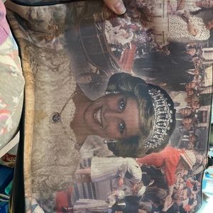 Princess Di purse. Brand new never been used. Probably could sell for more.